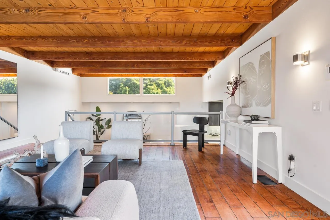 13711 Mercado Drive Del Mar, CA 92014 - Photo 14 of 46 a living room with furniture and a table