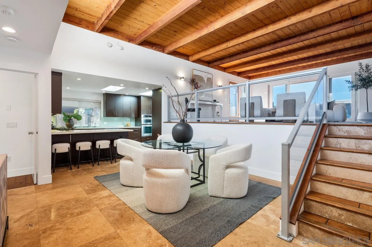 13711 Mercado Drive Del Mar, CA 92014 - Photo 18 of 46 a dining room with furniture and a view of kitchen