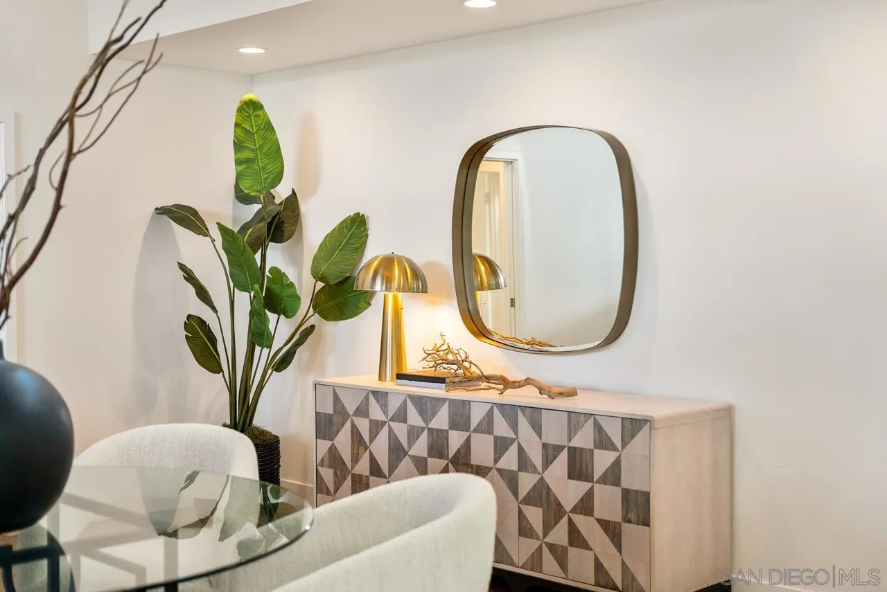 13711 Mercado Drive Del Mar, CA 92014 - Photo 19 of 46 a bathroom with a bathtub and a mirror