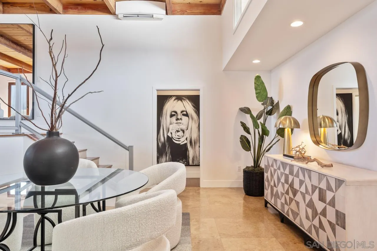 13711 Mercado Drive Del Mar, CA 92014 - Photo 20 of 46 a living room with furniture and a chandelier