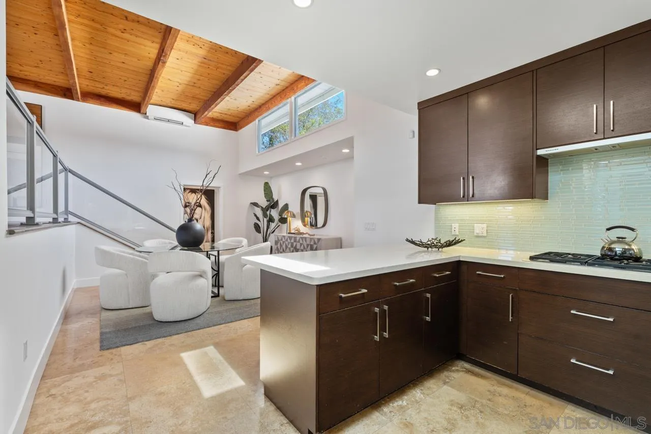 13711 Mercado Drive Del Mar, CA 92014 - Photo 21 of 46 a kitchen with a sink and cabinets