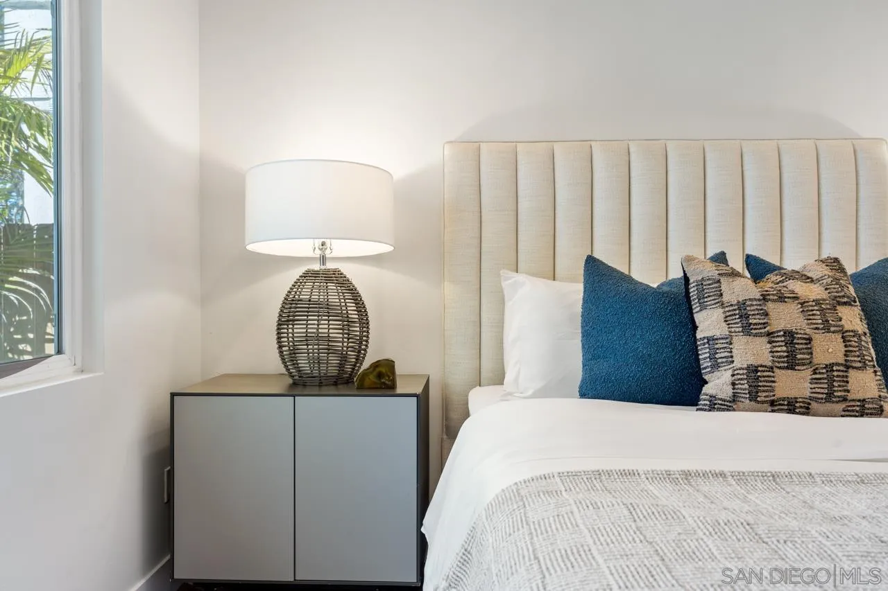 13711 Mercado Drive Del Mar, CA 92014 - Photo 36 of 46 a view of a bedroom with furniture and wooden floor