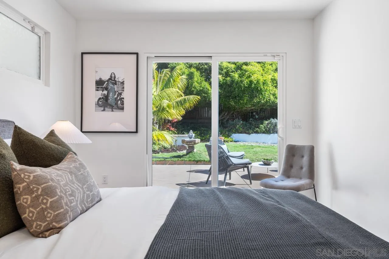 13711 Mercado Drive Del Mar, CA 92014 - Photo 40 of 46 a living room with furniture and large window