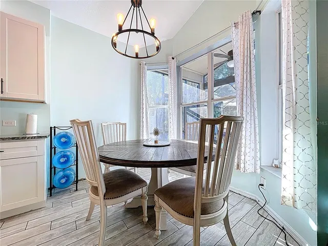 a large kitchen with granite countertop a lot of counter space