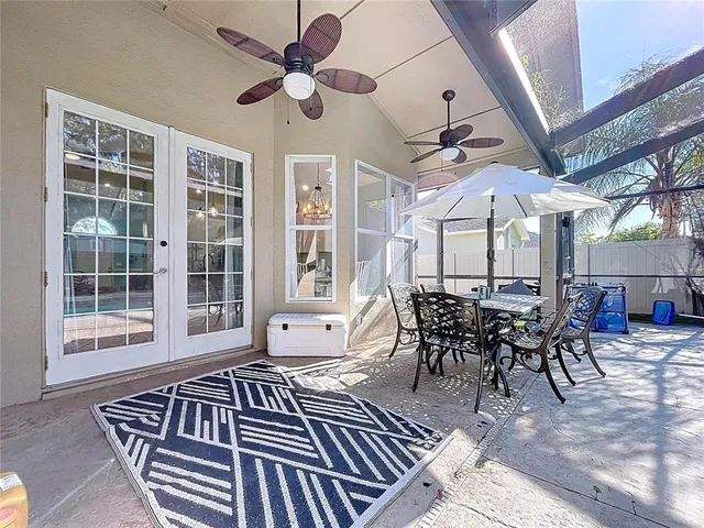 an aerial view of a houses with a city street