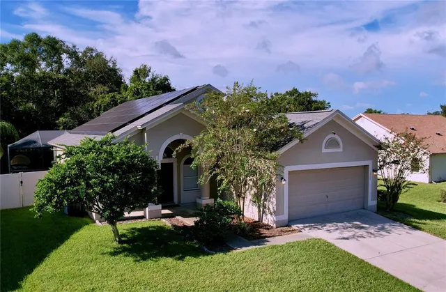 front view of a house with a yard