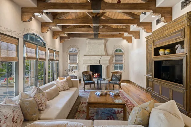 a spacious bathroom with a granite countertop sink and a large mirror