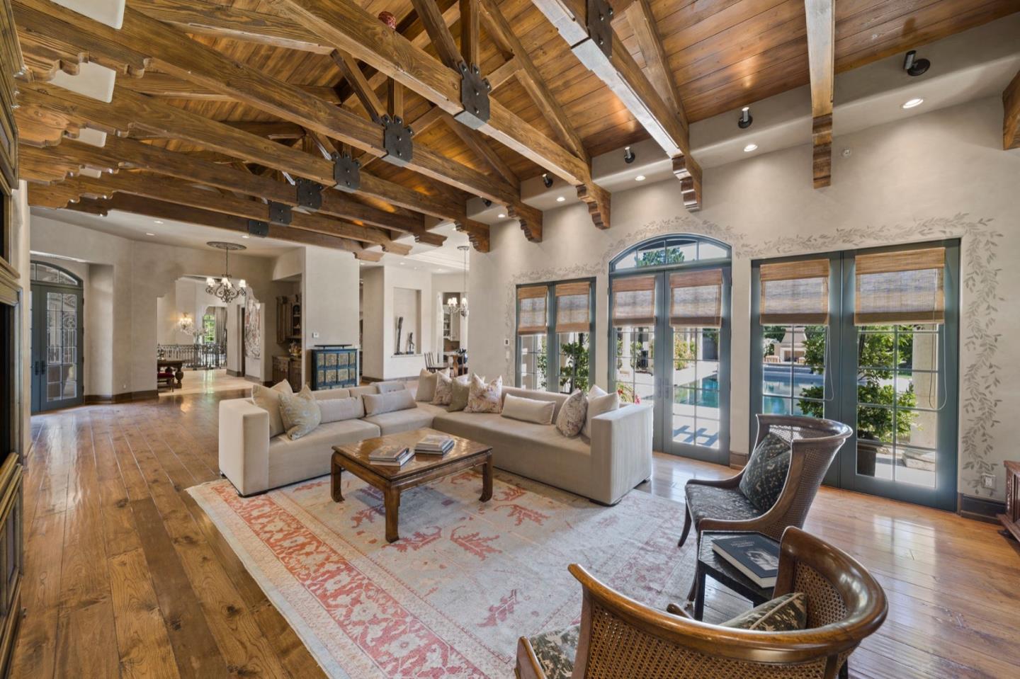 25751 Elena Road Los Altos Hills, CA 94022 - Photo 19 of 80 a living room with furniture and a large window