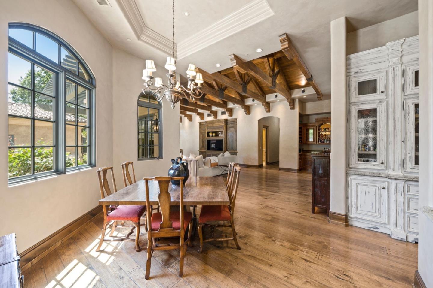 25751 Elena Road Los Altos Hills, CA 94022 - Photo 23 of 80 a view of a dining room with furniture window and wooden floor