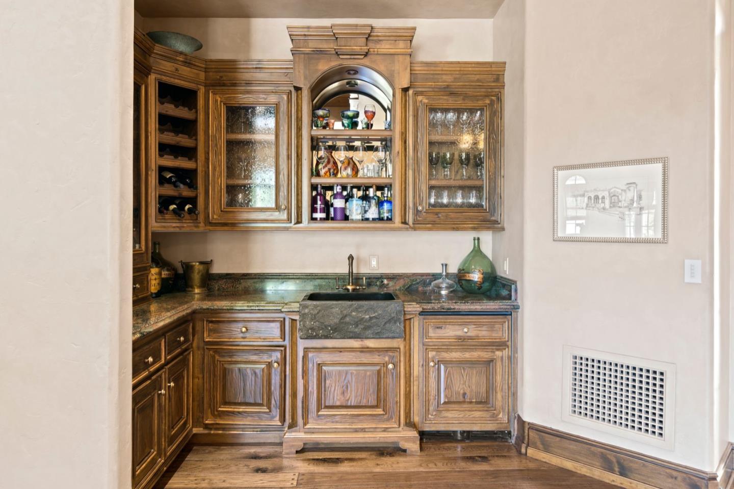 25751 Elena Road Los Altos Hills, CA 94022 - Photo 25 of 80 a kitchen with stainless steel appliances granite countertop a stove and a sink