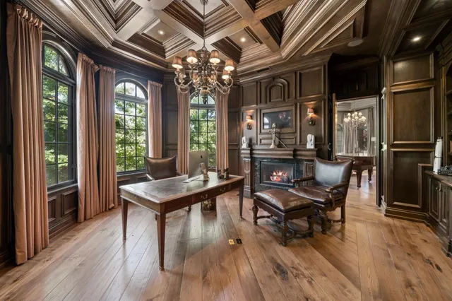 a view of a livingroom with furniture and a fireplace