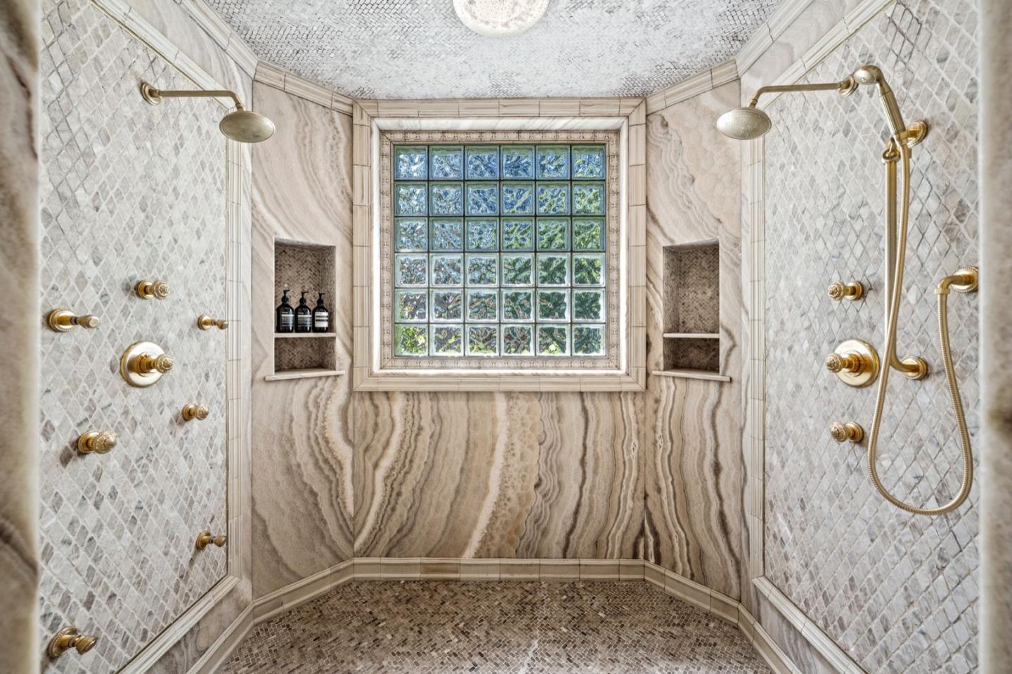 25751 Elena Road Los Altos Hills, CA 94022 - Photo 34 of 80 a bathroom with a granite countertop shower and a mirror