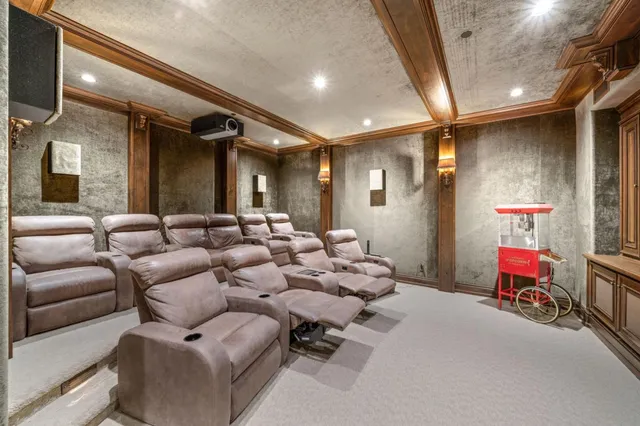 a large kitchen with stainless steel appliances granite countertop furniture and a large window