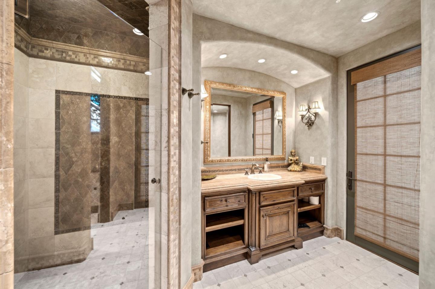 25751 Elena Road Los Altos Hills, CA 94022 - Photo 43 of 80 a bathroom with a double vanity sink mirror and shower
