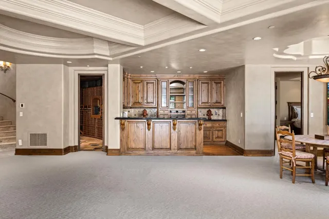 a view of house with outdoor space and sitting area