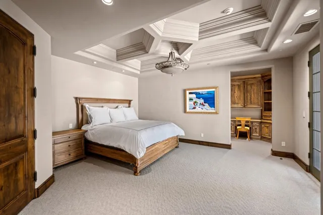 a view of a swimming pool with outdoor seating