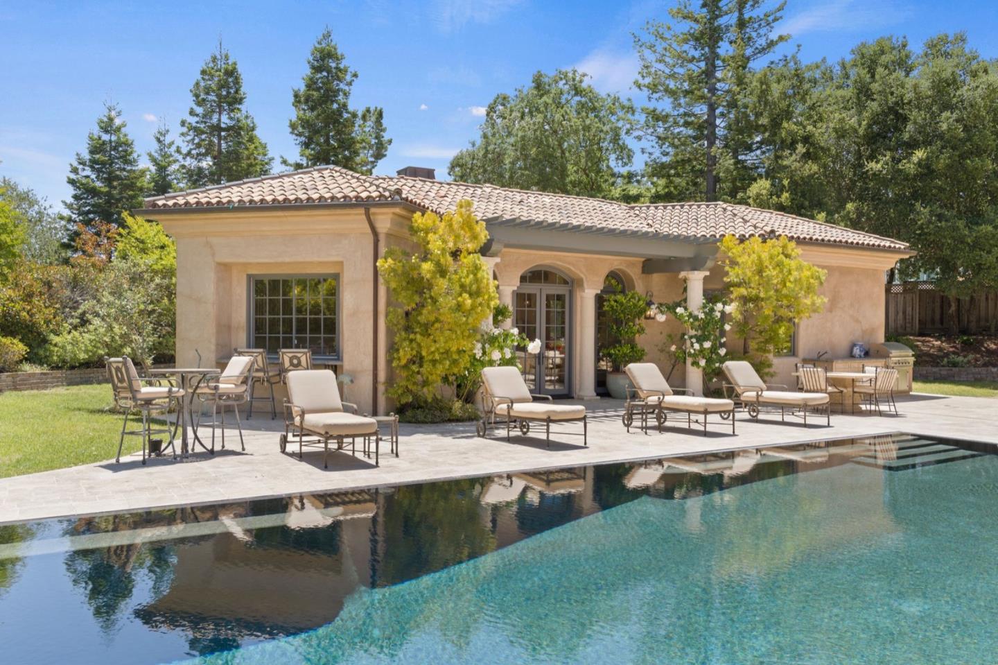 25751 Elena Road Los Altos Hills, CA 94022 - Photo 56 of 80 a view of house with swimming pool and outdoor seating