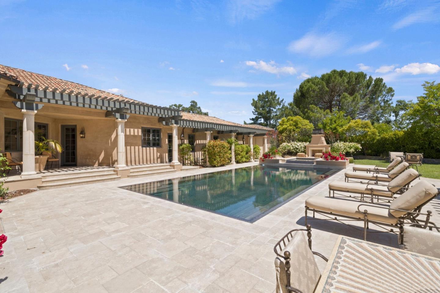 25751 Elena Road Los Altos Hills, CA 94022 - Photo 57 of 80 a view of a house with swimming pool and sitting area