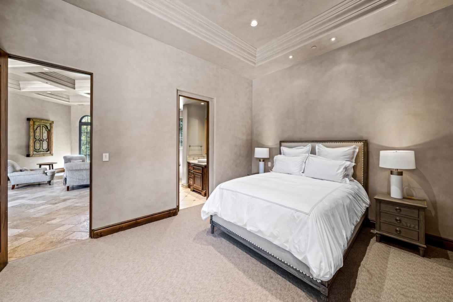25751 Elena Road Los Altos Hills, CA 94022 - Photo 65 of 80 a bedroom with a bed and a mirror