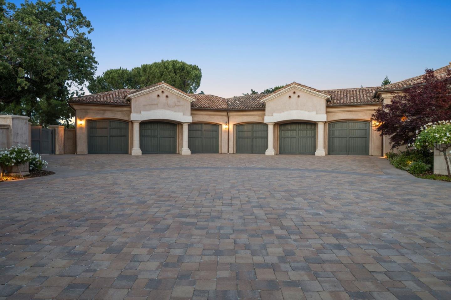 25751 Elena Road Los Altos Hills, CA 94022 - Photo 69 of 80 a front view of a house with a garden