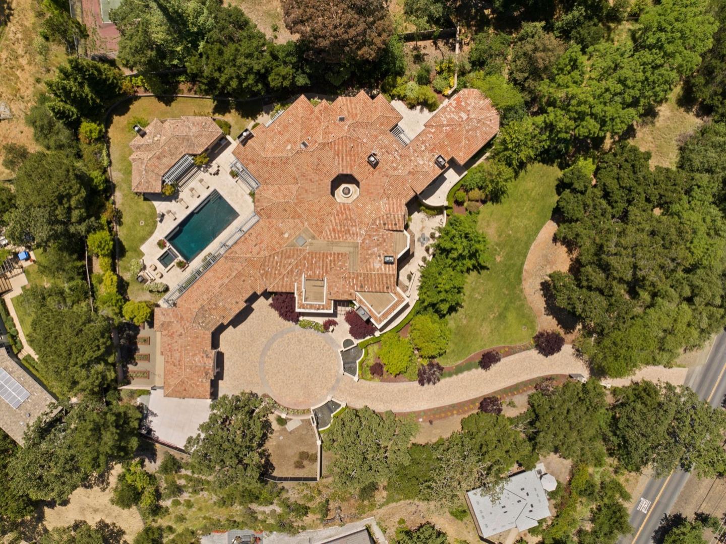 25751 Elena Road Los Altos Hills, CA 94022 - Photo 79 of 80 an aerial view of a house with a swimming pool and outdoor space