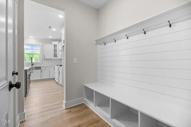 a bathroom with a bathtub and a sink