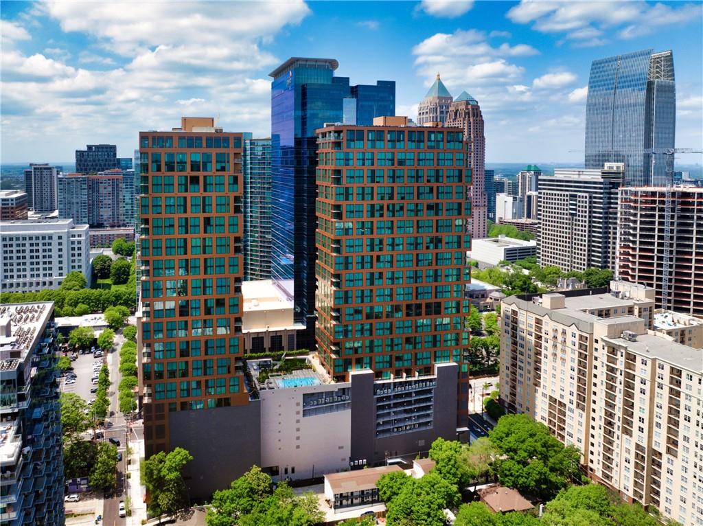 1081 Juniper Street Northeast, Unit S2C Atlanta, GA 30309 - Photo 1 of 46 a city view with tall buildings