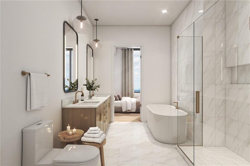 1081 Juniper Street Northeast, Unit S2C Atlanta, GA 30309 - Photo 26 of 46 a living room with furniture and a large window