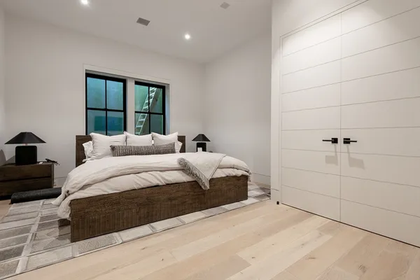 a view of living room with a flat tv screen and white walls