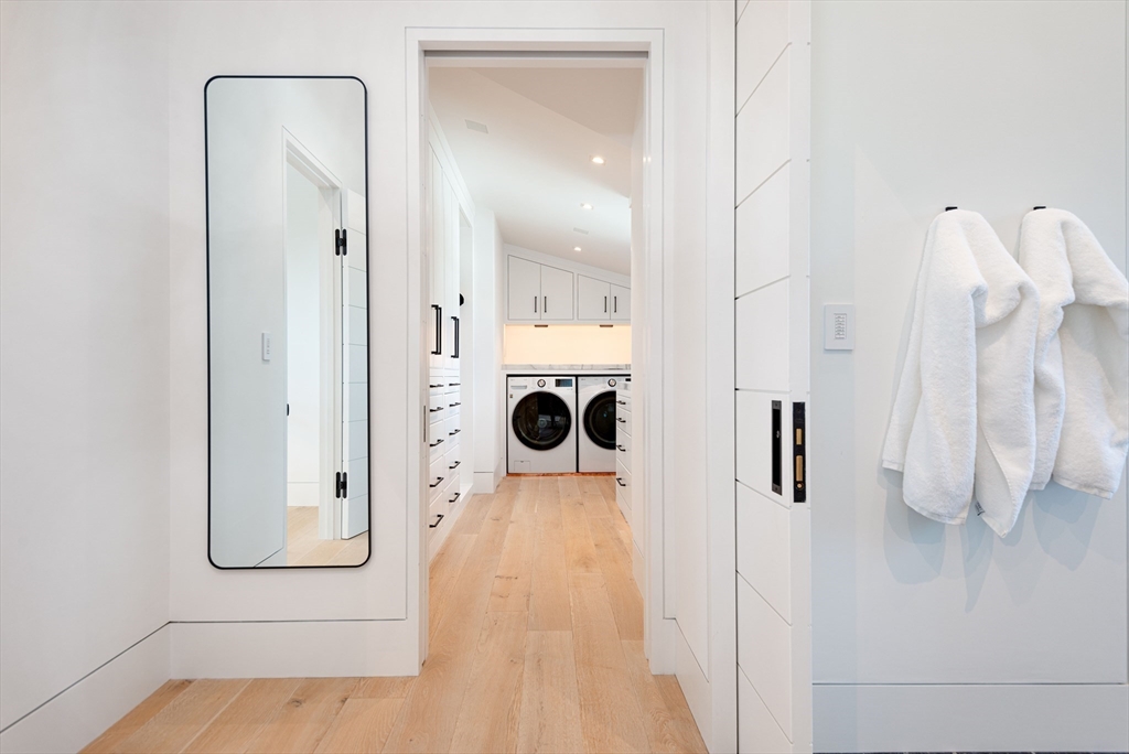 30 Devon Street, Unit THE DIPS Nantucket, MA 02554 - Photo 30 of 42 a view of living room with a flat tv screen and white walls
