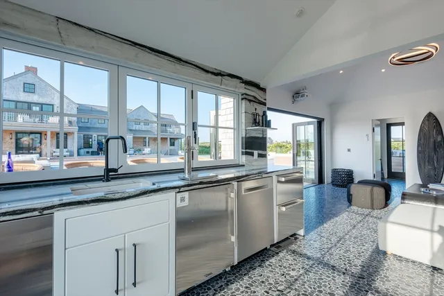 a bathroom with a sink and a shower
