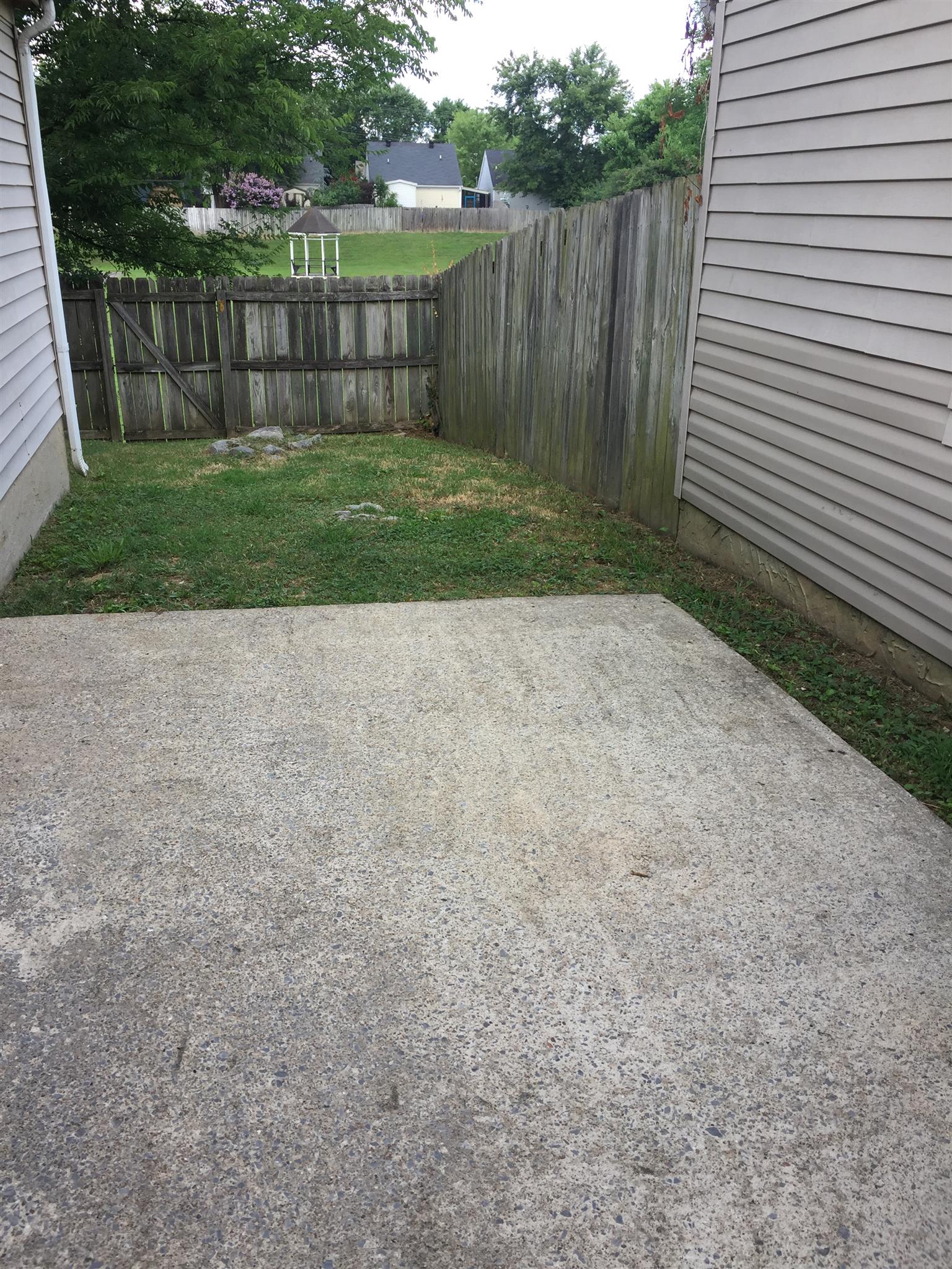 2308 Benay Road Nashville, TN 37214 - Photo 14 of 18 a view of a backyard with wooden fence