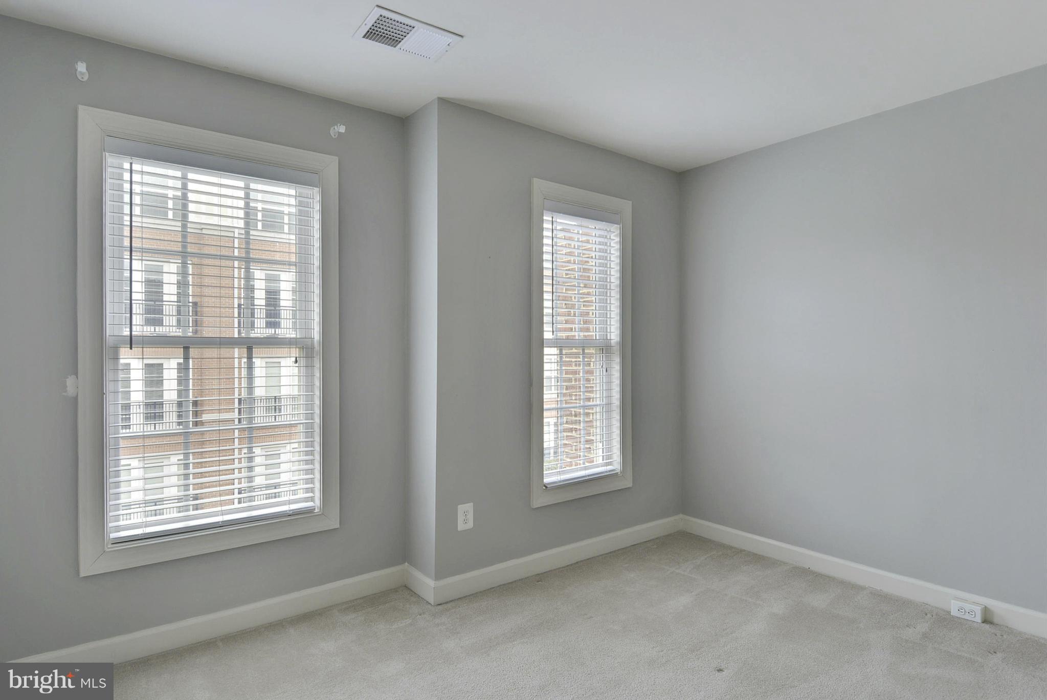 7976 Vigne Court Vienna, VA 22182 - Photo 14 of 30 Second bedroom with two large windows.