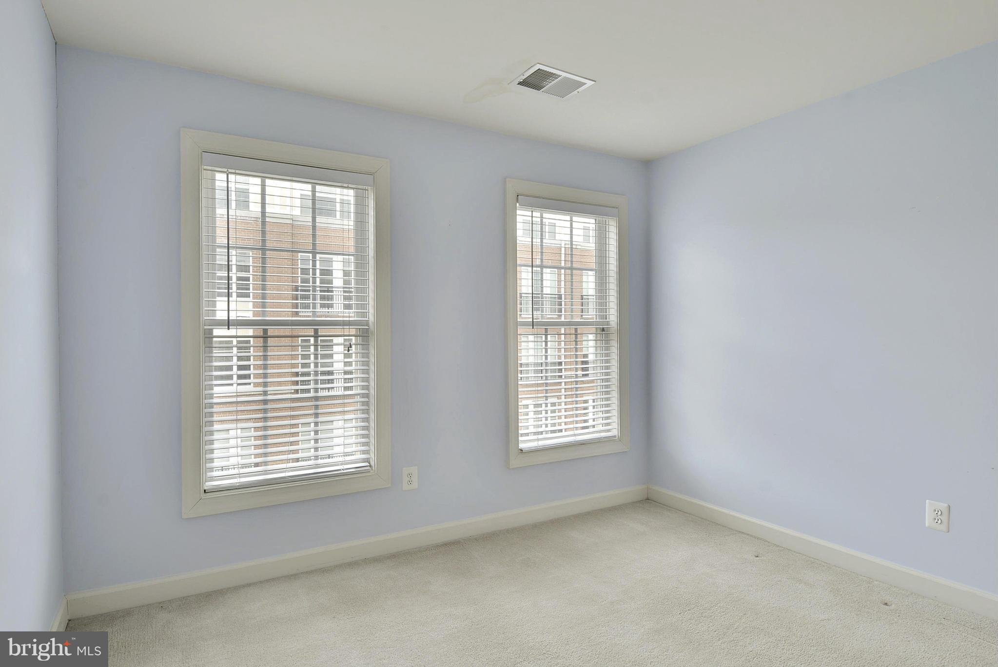 7976 Vigne Court Vienna, VA 22182 - Photo 16 of 30 Third bedroom with two large windows.