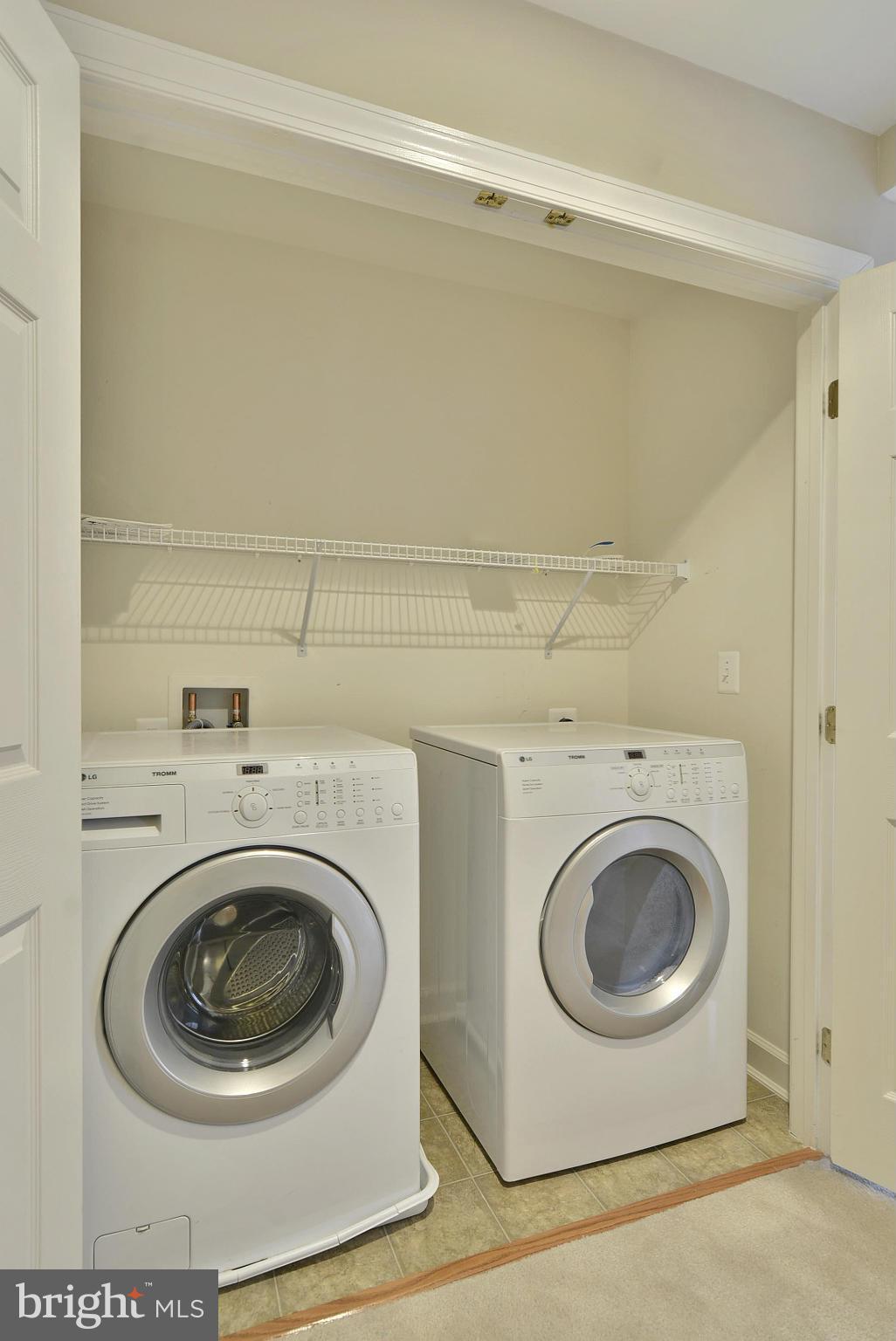 7976 Vigne Court Vienna, VA 22182 - Photo 17 of 30 Front load washer/dryer on upper level.