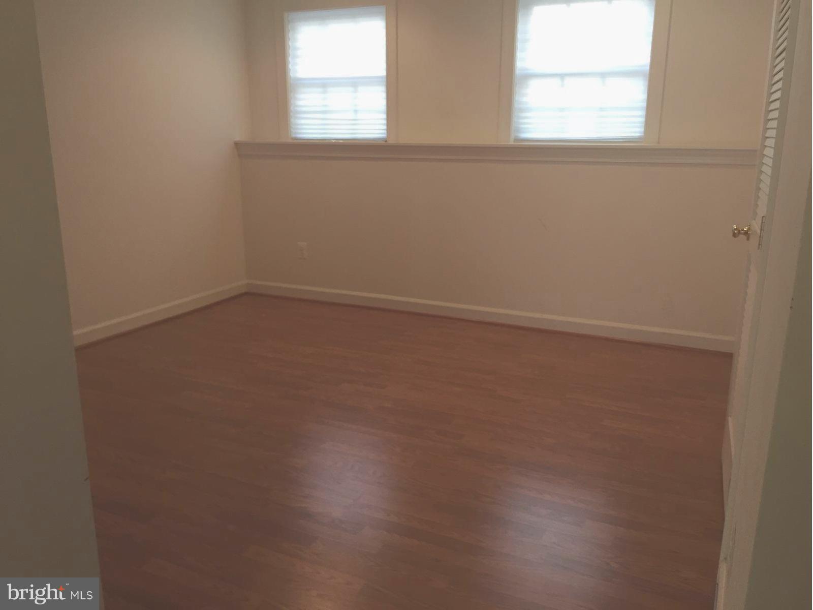 7976 Vigne Court Vienna, VA 22182 - Photo 21 of 30 Lower level recreation room with new floors.