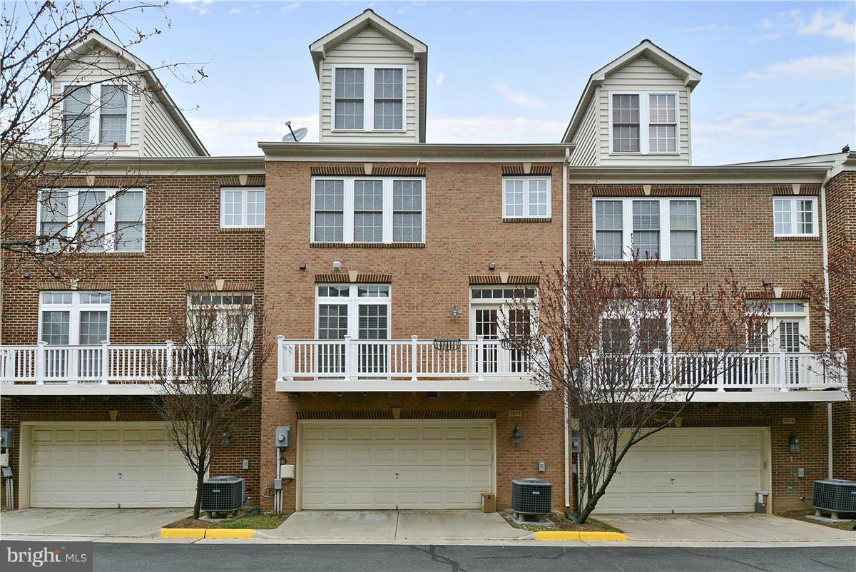 7976 Vigne Court Vienna, VA 22182 - Photo 24 of 30 Two car garage entrance way with concrete driveway