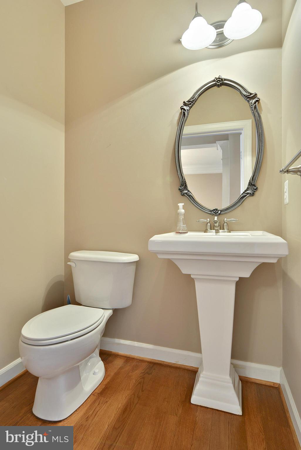 7976 Vigne Court Vienna, VA 22182 - Photo 9 of 30 Half bath on main level for your guests.