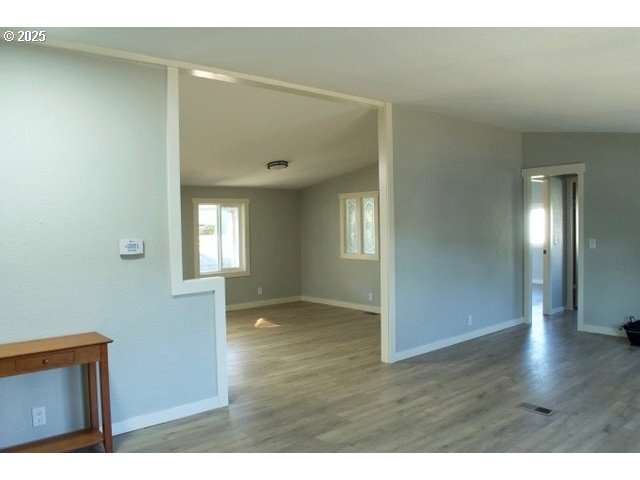 700 Northeast 183rd Avenue, Unit 7 Portland, OR 97230 - Photo 6 of 27 a view interior of a house wooden floor and windows