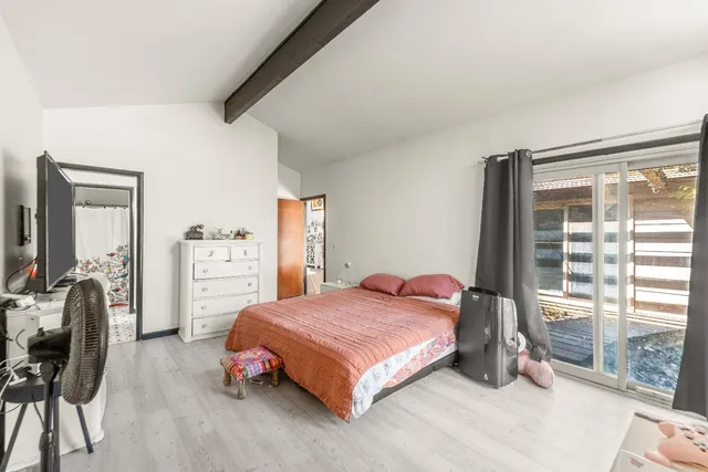 a view of a kitchen with a sink and a fireplace