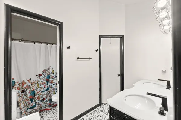 a kitchen that has a stove and a refrigerator