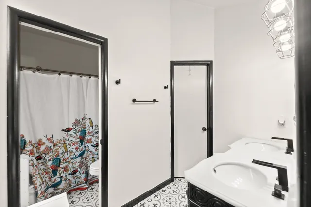 a kitchen that has a stove and a refrigerator