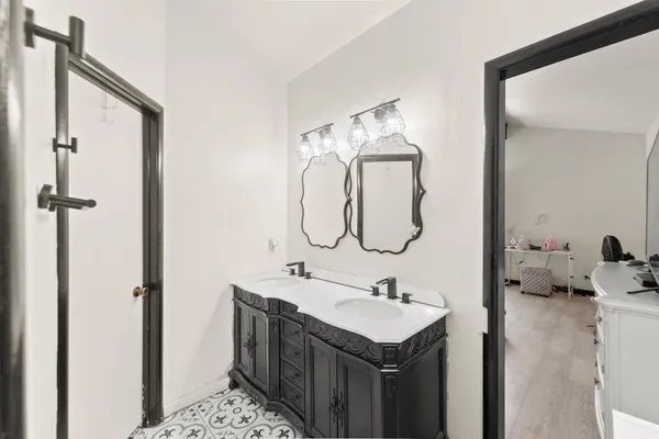 a kitchen with a refrigerator a sink and dishwasher