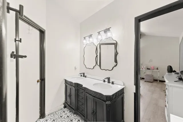 a kitchen with a refrigerator a sink and dishwasher