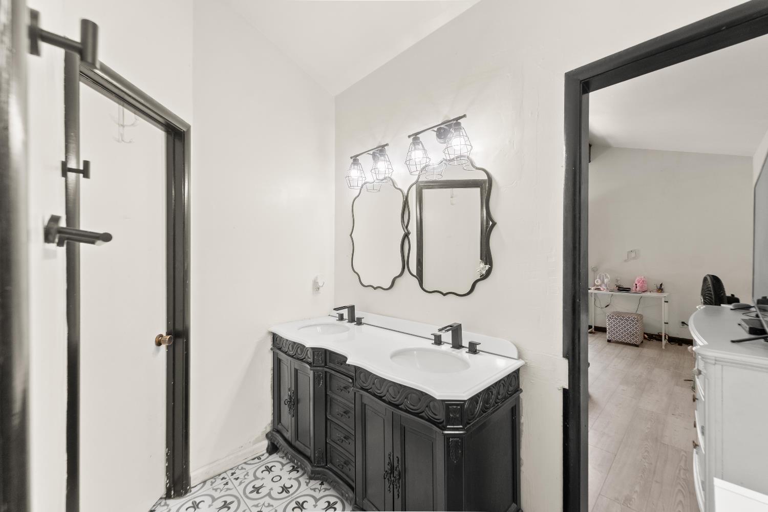 738 Webster Street Colusa, CA 95932 - Photo 28 of 56 a bathroom with a sink and a mirror
