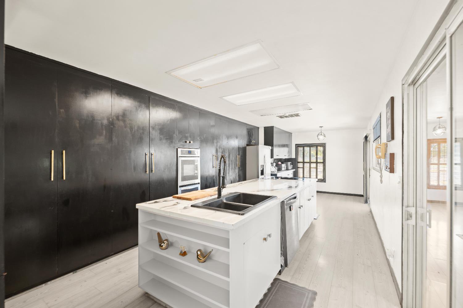 738 Webster Street Colusa, CA 95932 - Photo 33 of 56 a kitchen that has a stove and a refrigerator