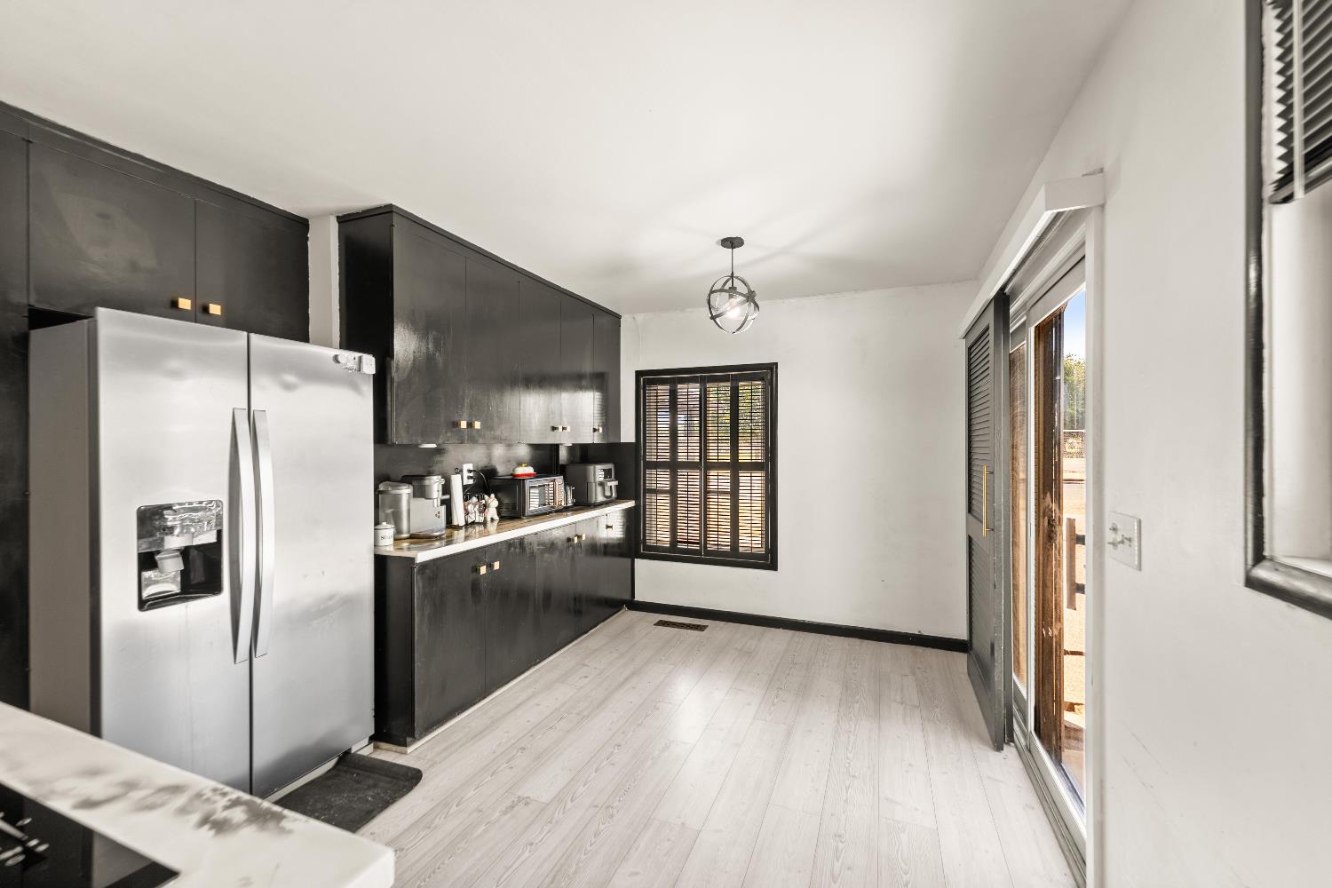 738 Webster Street Colusa, CA 95932 - Photo 35 of 56 a kitchen with stainless steel appliances a refrigerator and a stove top oven