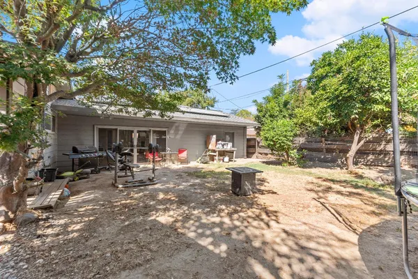 an aerial view of residential house with outdoor space