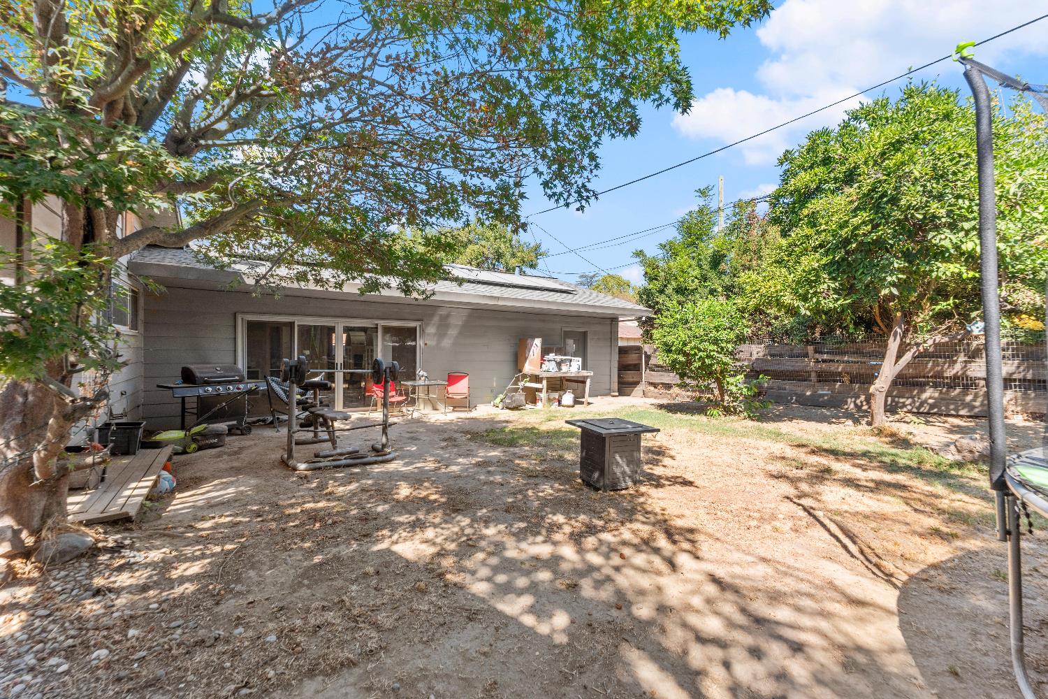 738 Webster Street Colusa, CA 95932 - Photo 49 of 56 a view of a house with backyard sitting area and garden