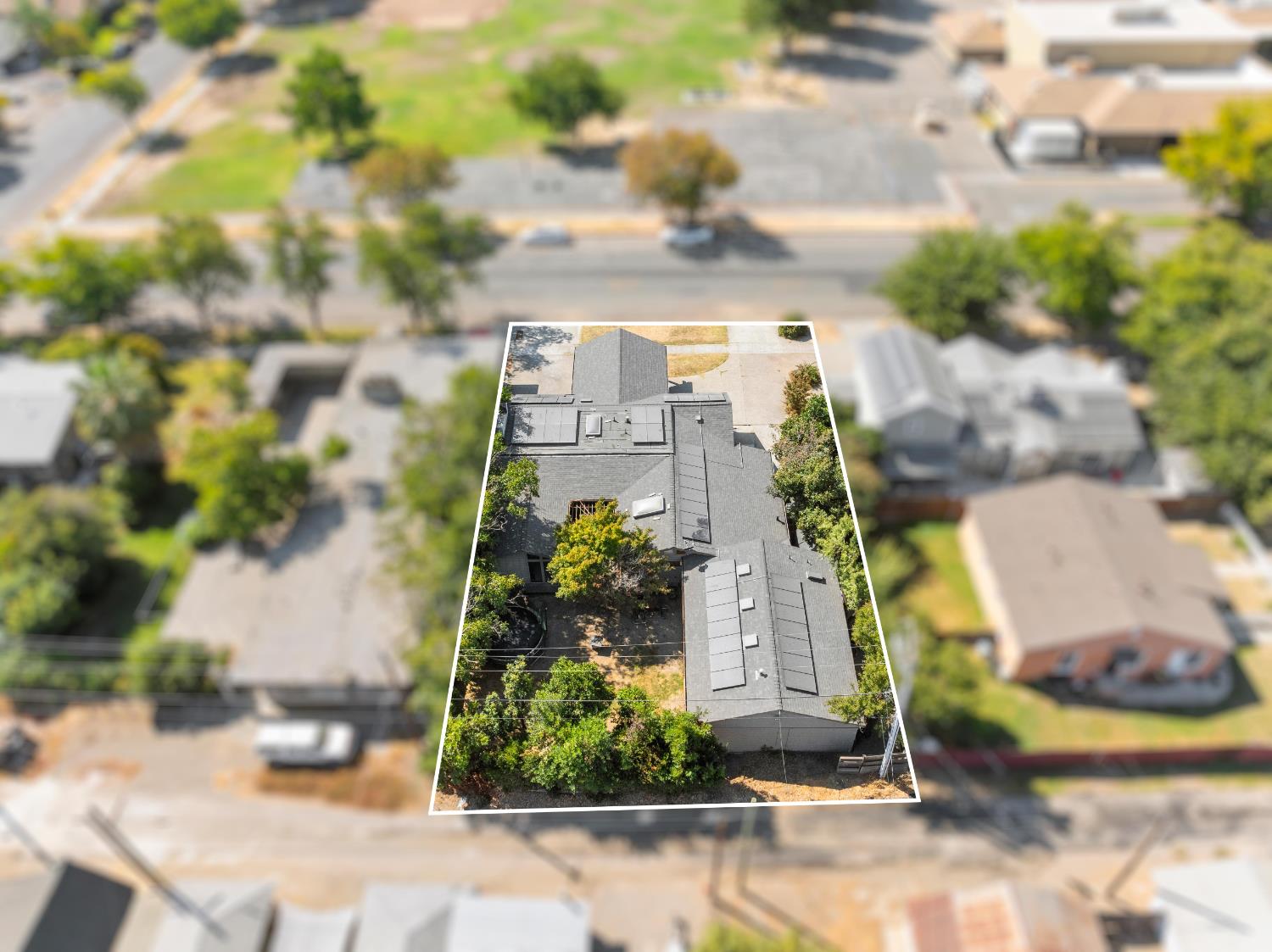 738 Webster Street Colusa, CA 95932 - Photo 52 of 56 a view of a multi story residential apartment building with yard and parking space